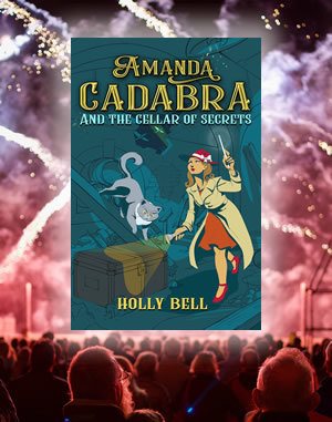 Cover reveal Amanda Cadabra and The Cellar of Secrets book 2 in the cozy paranormal mystery series: witch with wand and grey cat in dim cellar. She looks up through a hole at planes flying over and her torch points at a trunk on the floor. The cover is on a stage with fireworks. Audience in the foreground