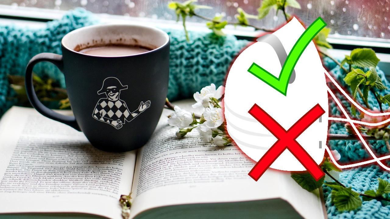 COVID-19 in a Cozy Mystery - Do You Want It? Cosy scene of coffee mug on book and next to it a white mask with a green tick above a red cross