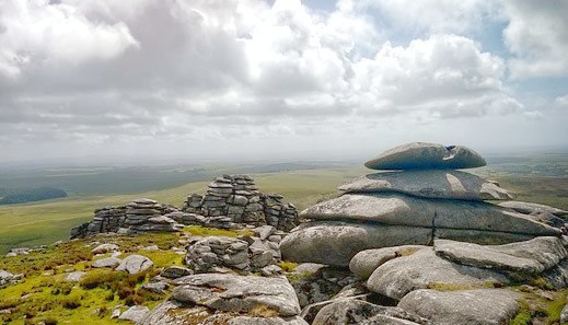 Tor on Bodmin Mor looking out over green wild landscape