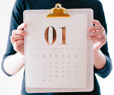 Woman hands holding calendar