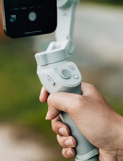 Hand holding phone gimbal