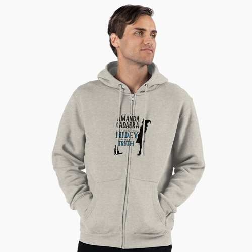 zip hoodie grey with . On the front: Amanda Cadabra and The Hidey-Hole Truth text with silhouette of Amanda in witch hat  looking up, on the right of the text, and silhouette of Tempest, her cat and familiar opposite her feet below and on the left of the text 