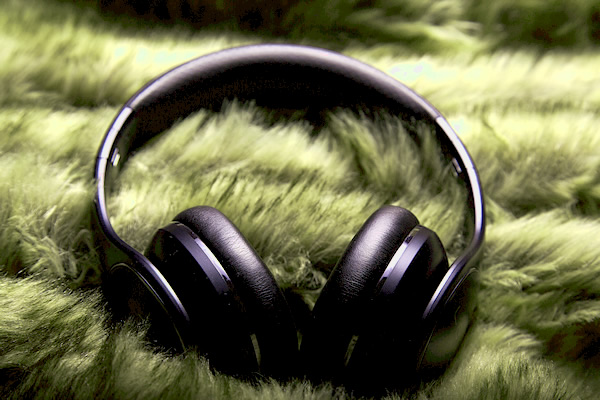 Headphones on green fur